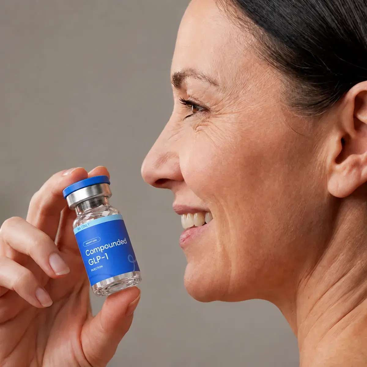 Woman looking at a LumiMeds Semaglutide vial